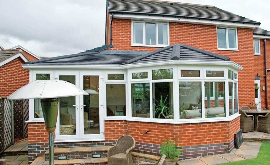 P-Shaped conservatory with a tiled roof